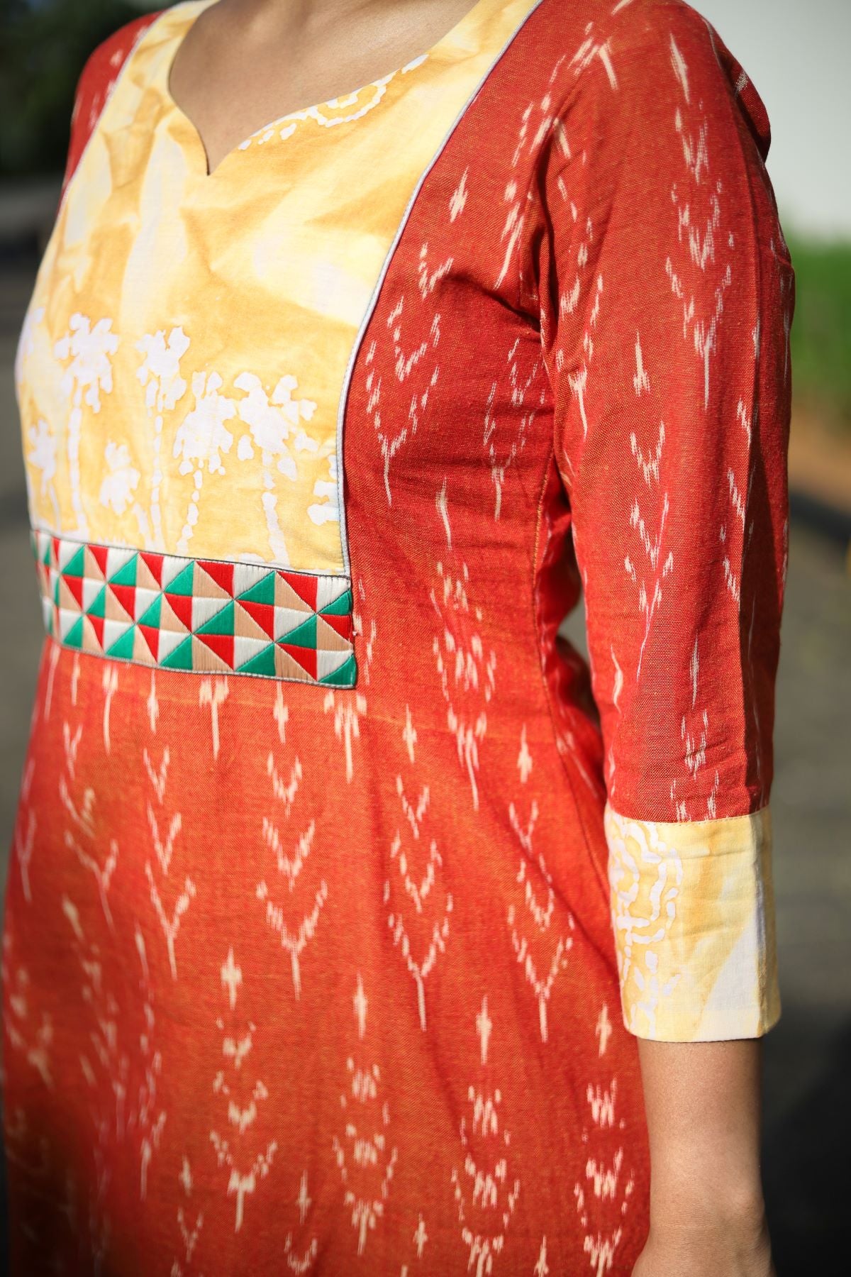 Ikat Cotton Y Neck A line Kurta with Bathik Cotton Patches and Phoolkari Lace Details, Rust - Orange, KI1039