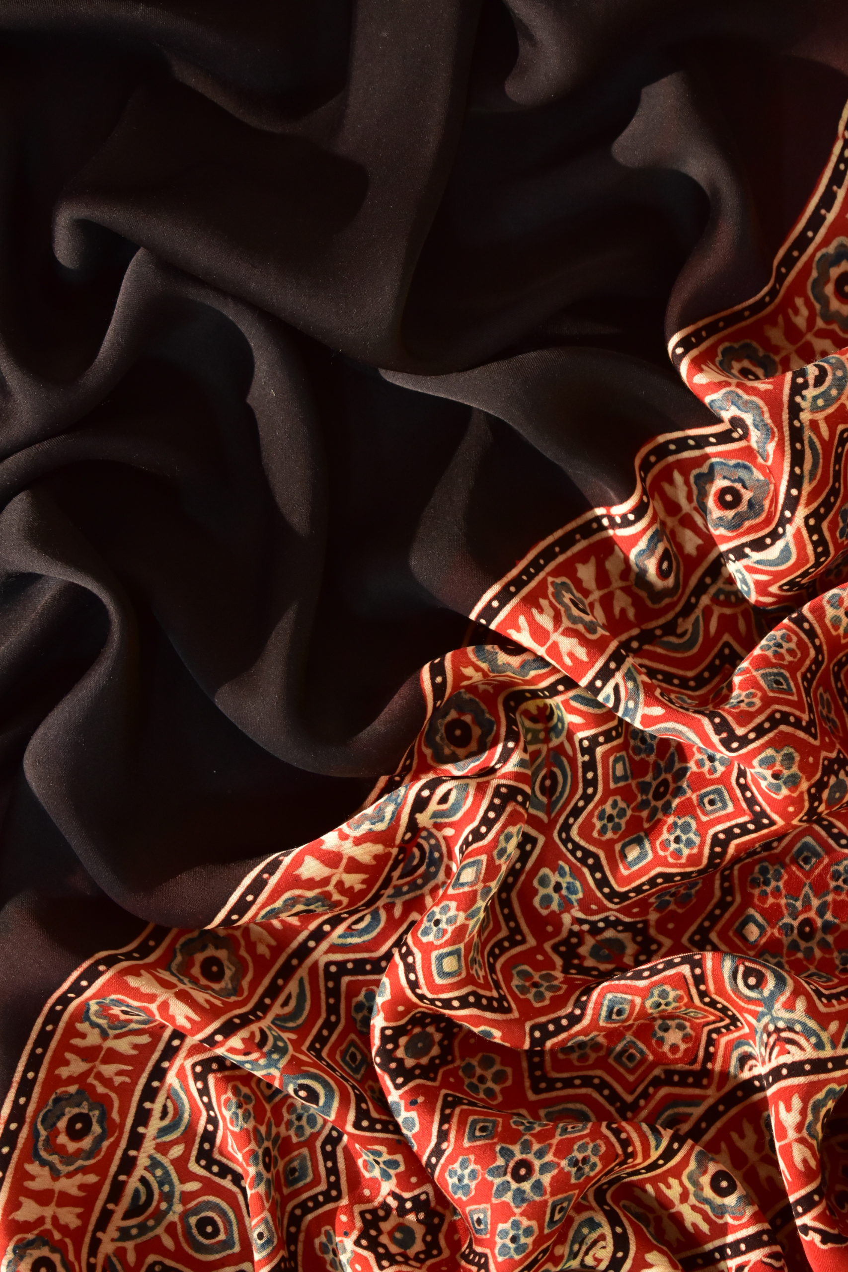 Somber Black & Ruby Red Modal Silk Saree with Plain body, Ajrakh border Pallu & Blouse Piece, SS1020 Somber Black & Ruby Red Modal Silk Saree with Plain body, Ajrakh border Pallu & Blouse Piece, SS1020